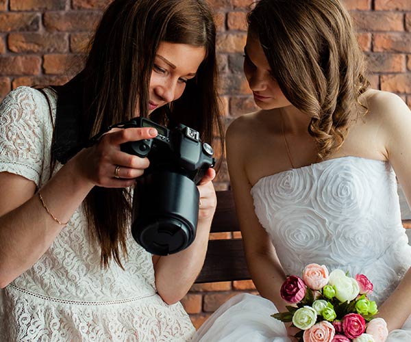 Bride with photographer