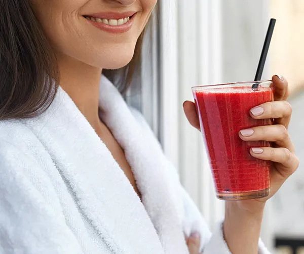 Bloody Mary Mixes Could Pack On Calories And Sodium woman with drink
