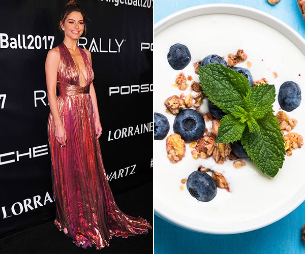 maria menounos with yogurt, granola and blueberries in a bowl