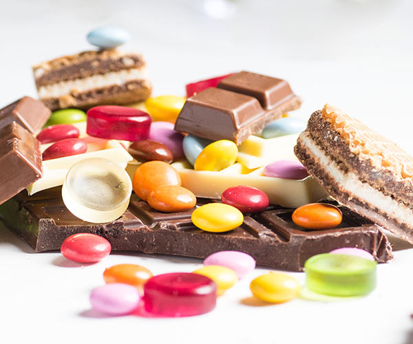 assorted chocolate and candy on a table
