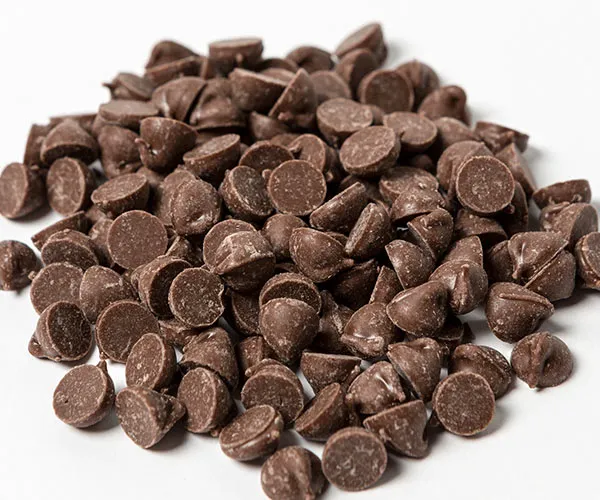 Carob chips in a stylish bowl for healthy snacking