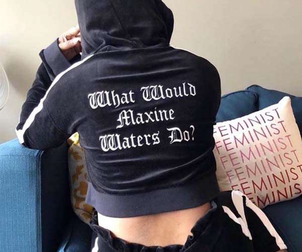 woman wearing feminist hoodie
