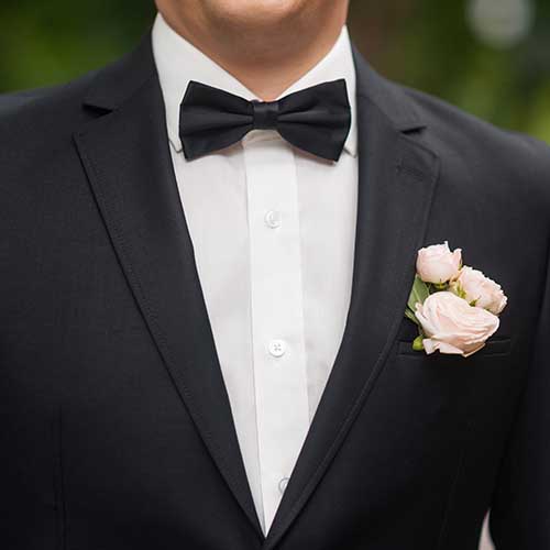 groom wearing tuxedo