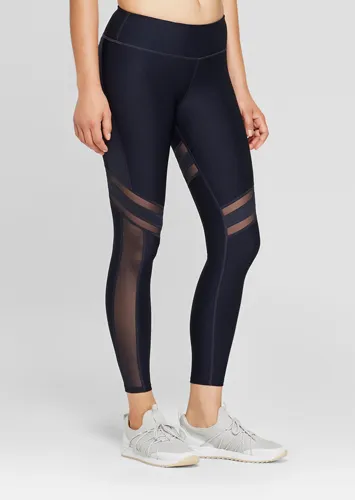 Mesh high-waisted leggings combining style and breathability.