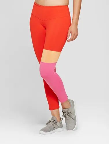 Premium asymmetrical leggings adding a unique flair.