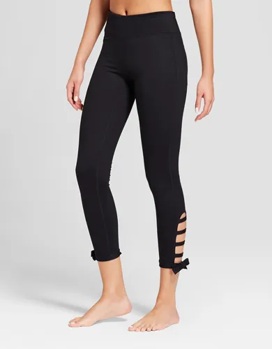 Side-tie mid-rise leggings for a trendy, adjustable fit.