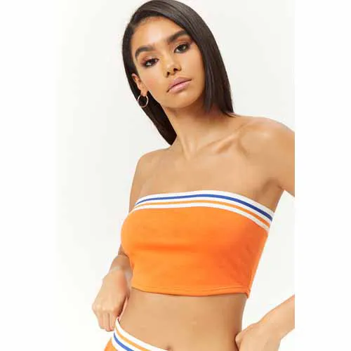 "Hailey Baldwin posing in another angle of the orange crop top"