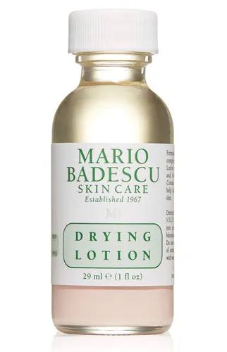Mario Badescu Drying Lotion bottle on a clean surface.