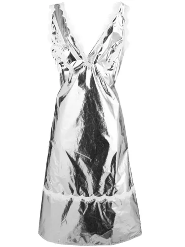 Chic metallic lace trim dress showcased by a famous figure.