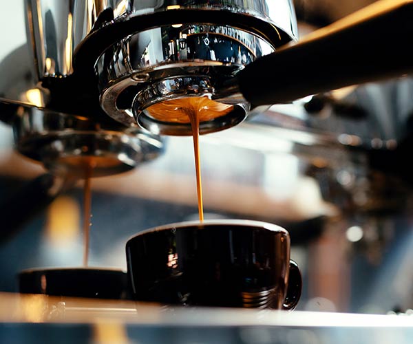 espresso machine making a latte