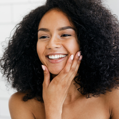 woman applying skincare products