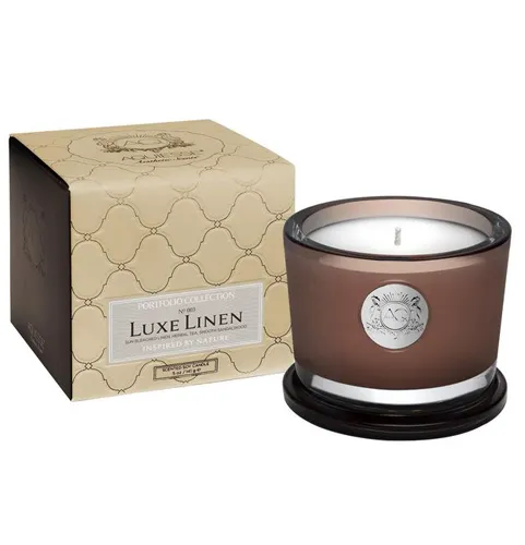 "Aquiesse candle surrounded by natural elements"