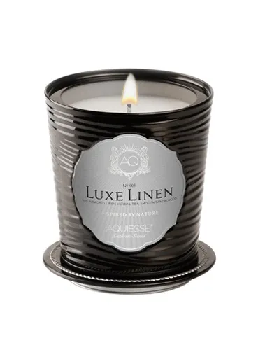 "Aquiesse candle with decorative elements"