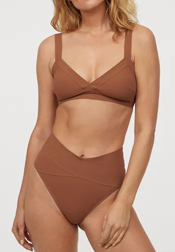 High-waisted bikini bottoms for a flattering fit