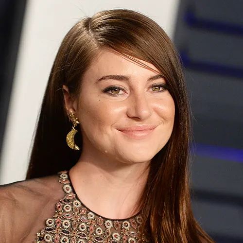 Shailene Woodley smiling during an outdoor appearance