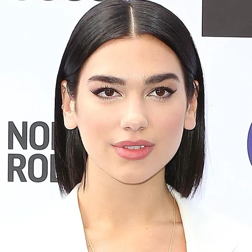 Dua Lipa showcasing her style at a red carpet event
