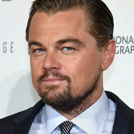 Portrait of Leonardo DiCaprio smiling at the camera.
