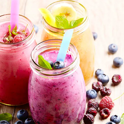 "Fresh smoothies in glasses"