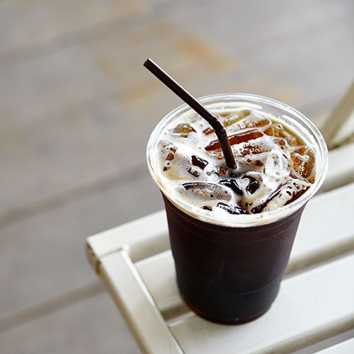 Ice coffee in a plastic cup.