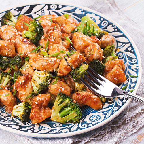 A bowl of honey garlic chicken.