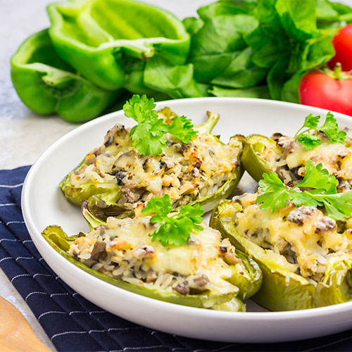 Stuffed bell peppers on a plate.