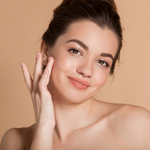 woman touching her face