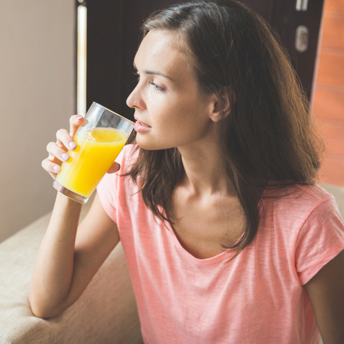 woman drinking juice