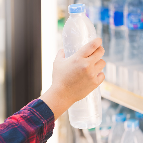 woman grabbing water