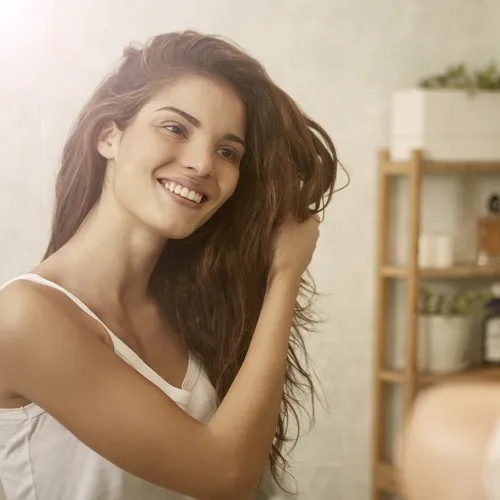 woman touching hair