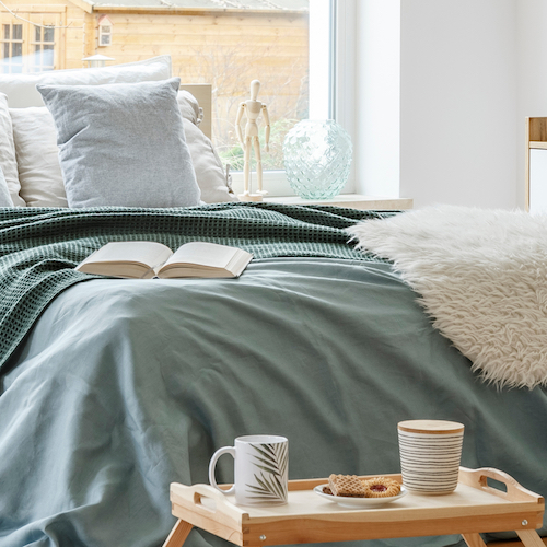 These Are The Best Blankets To Keep You Cozy & Comforted During The