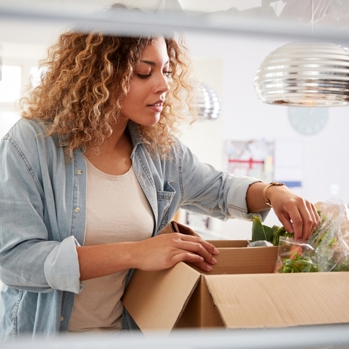 woman unpacking food