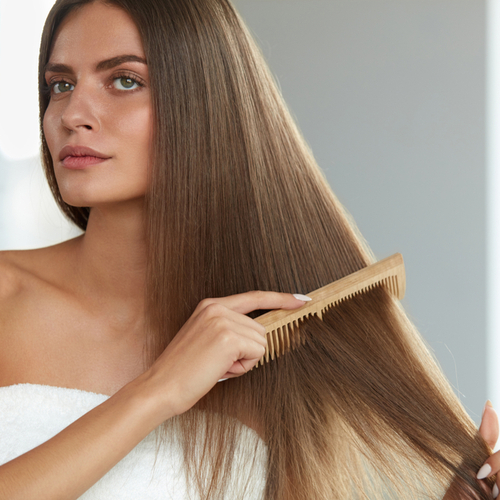 woman brushing hair