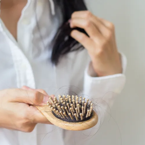 "Natural skincare ingredients on a rustic wooden surface"