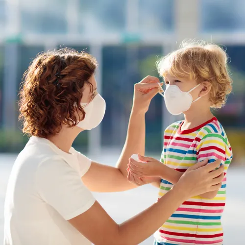 woman and kid with mask