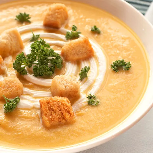 "Soup dish on a table"