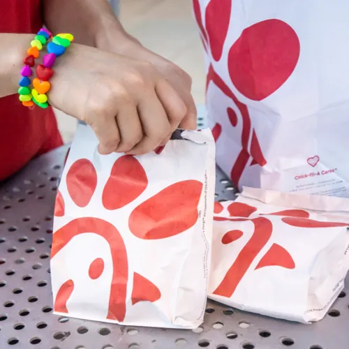 Close-up of Chick-fil-A waffle fries in a serving container.