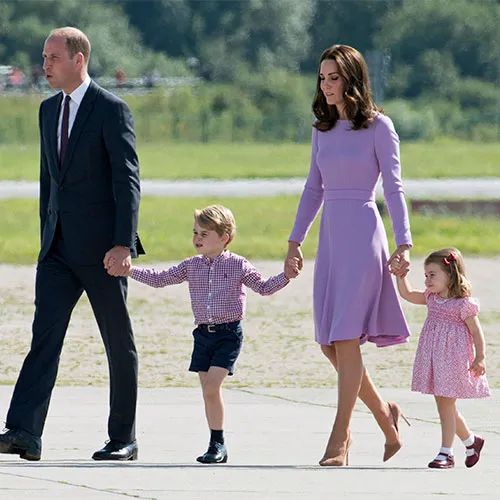 Kate Middleton in a stunning gown at a royal occasion.