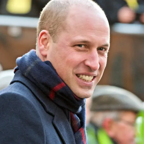 Prince William candidly interacting with fans.
