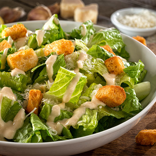 caesar dressing on salad