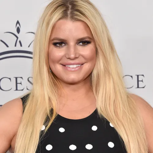 Jessica Simpson posing confidently for a fashion photoshoot.