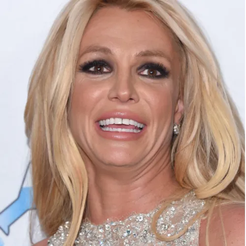 Britney Spears showcasing a glamorous hairstyle at an event.