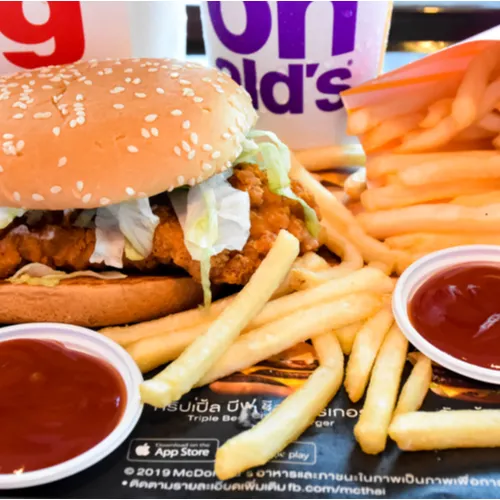 Crispy chicken sandwich with fresh toppings and bun