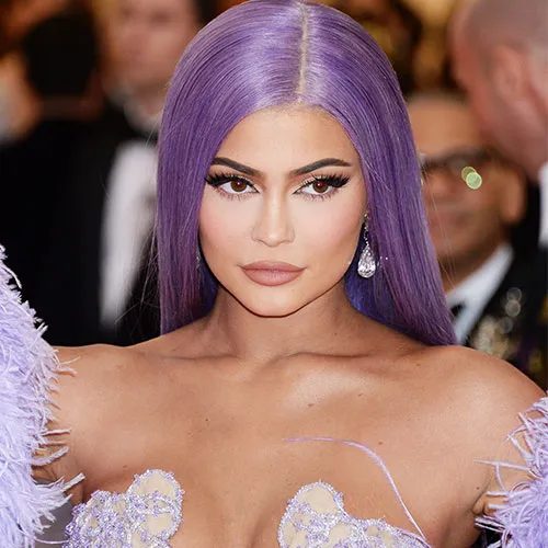 Kylie Jenner in a stunning latex outfit on the cover of Vogue.
