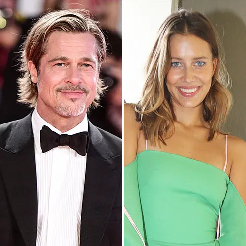 "Brad Pitt posing at a movie premiere"