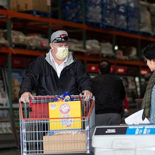Family enjoying snacks during a Costco visit.