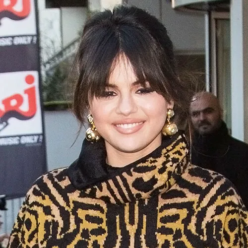 "Selena Gomez showcasing her hairstyle"