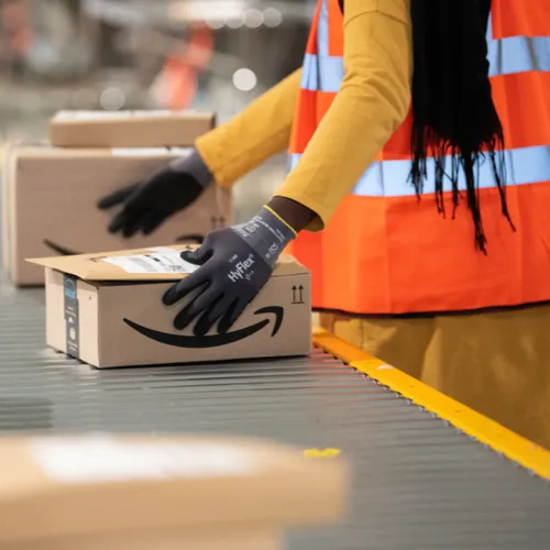 "Amazon warehouse employee working"
