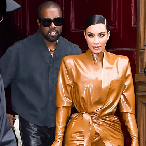 Kim Kardashian and Kanye West at a glamorous event.