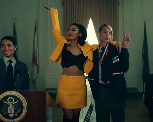 Ariana Grande showcasing her iconic hairstyle and makeup look.