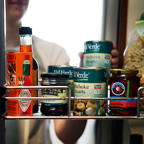 woman looking in pantry